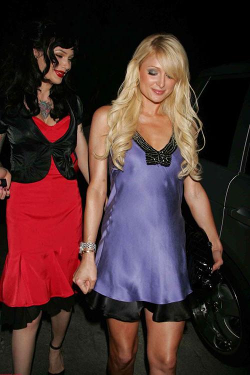 16P Paris Hilton posing sexy in see thru and in fishnet pantyhose