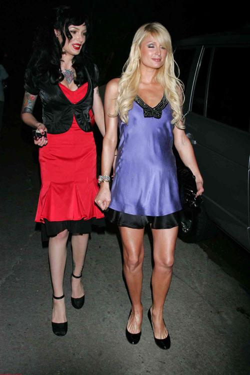 16P Paris Hilton posing sexy in see thru and in fishnet pantyhose