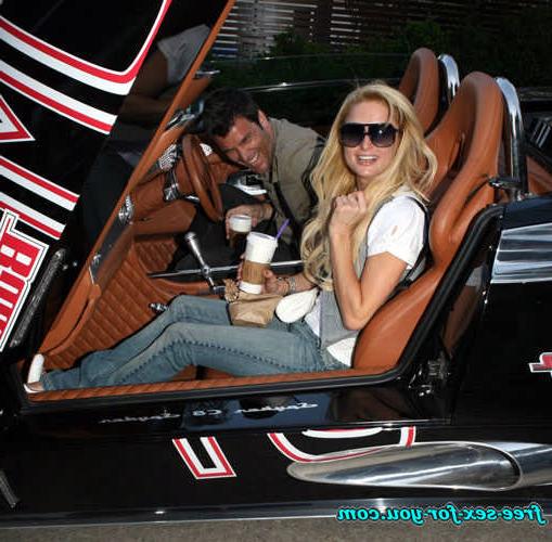 16P Paris Hilton posing in see thru and in fishnet pantyhose