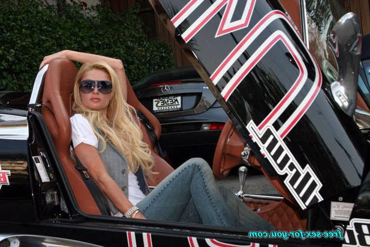 16P Paris Hilton posing in see thru and in fishnet pantyhose