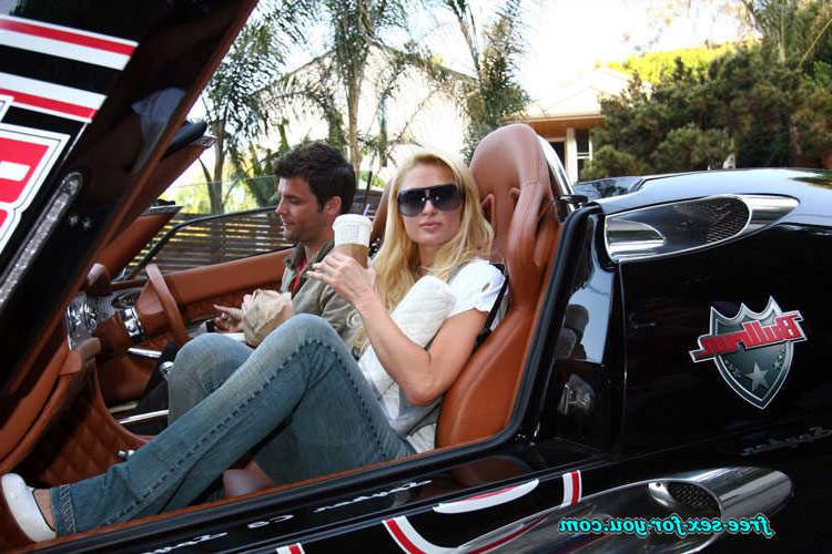 16P Paris Hilton posing in see thru and in fishnet pantyhose