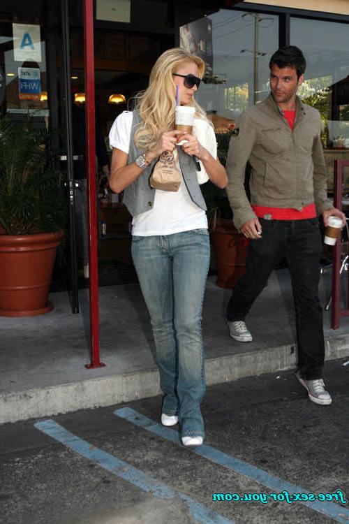 16P Paris Hilton posing in see thru and in fishnet pantyhose