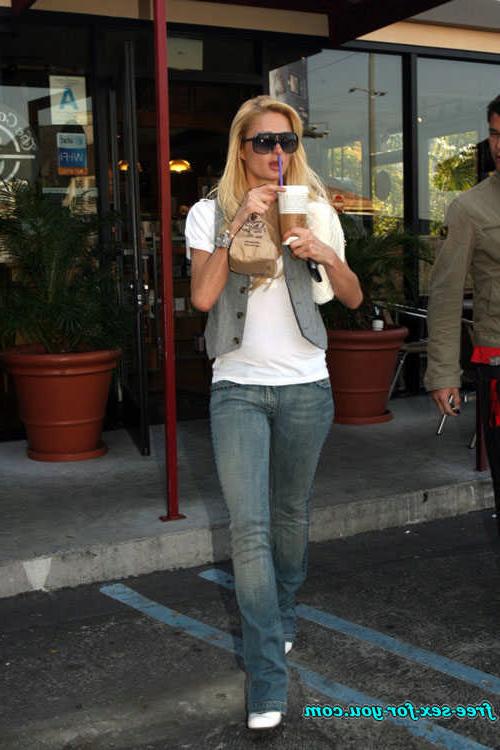 16P Paris Hilton posing in see thru and in fishnet pantyhose