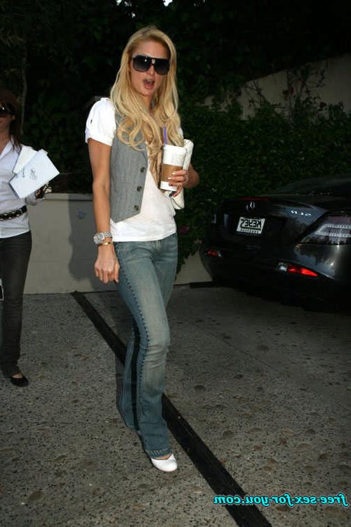 16P Paris Hilton posing in see thru and in fishnet pantyhose