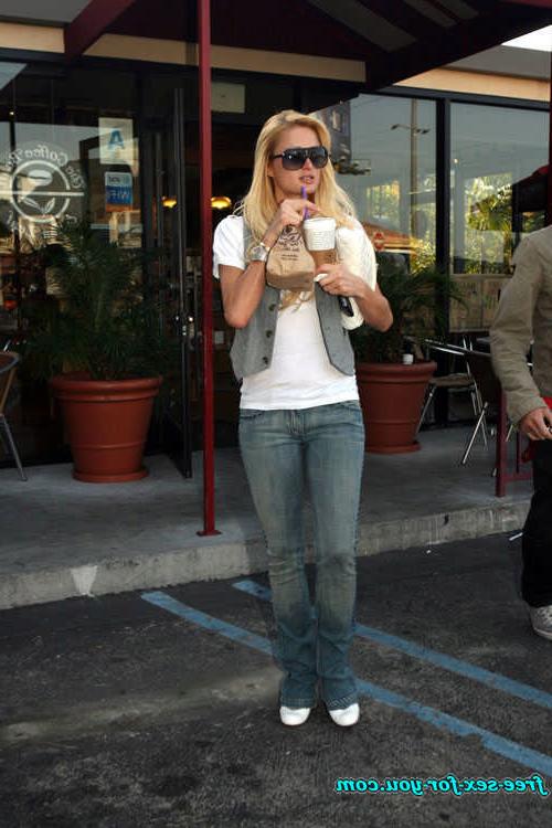 16P Paris Hilton posing in see thru and in fishnet pantyhose