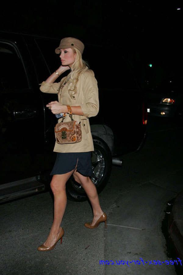16P Paris Hilton posing naked and in fishnet stockings