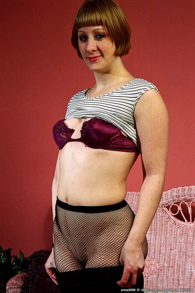 12P Shaved amateur housewife in fishnet stockings