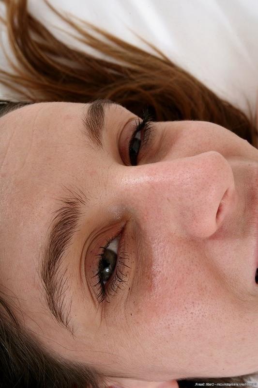 15P Cute coed Shelly exposes her hairy pussy patch