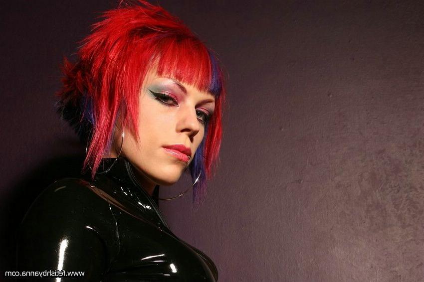 11P fetishist wears black latex dress with fishnet stockings