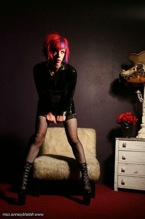 11P fetishist wears black latex dress with fishnet stockings