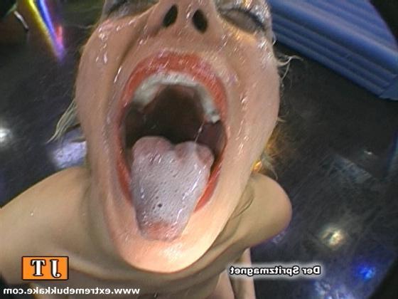 20P Nasty teen blonde slut swallowing a ton of cum in a bukkake