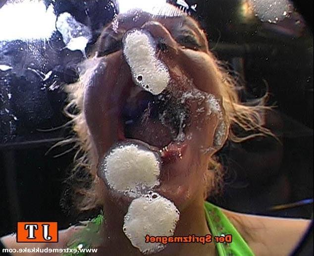 20P Nasty teen blonde slut swallowing a ton of cum in a bukkake