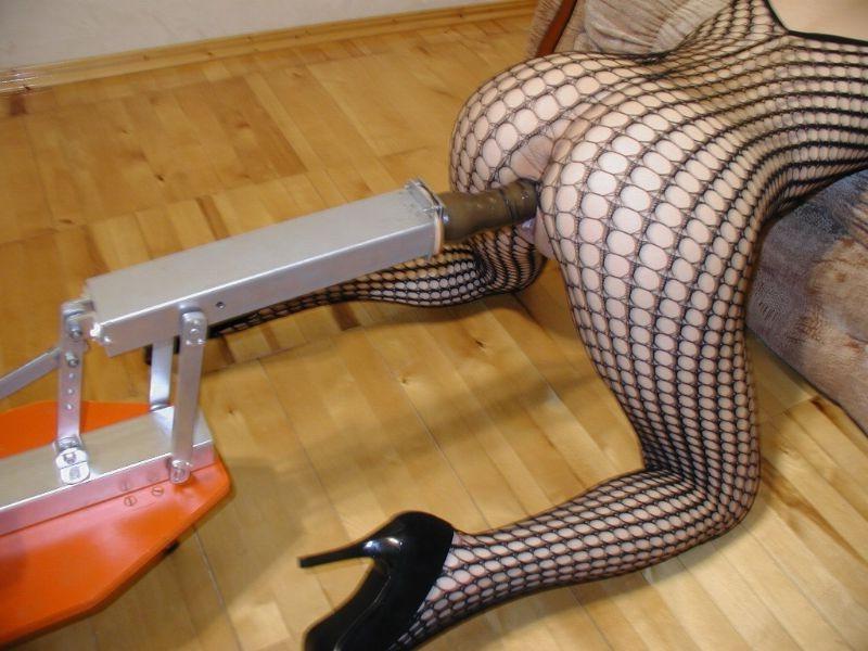 16P Redhead in fishnet stockings gets machine fucked