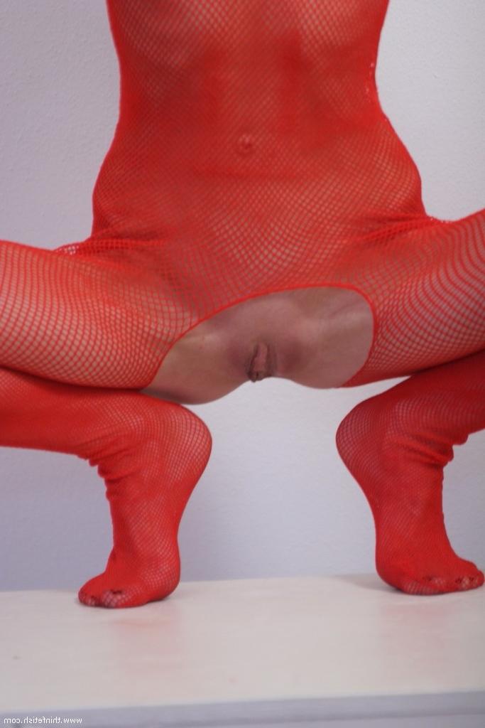 16P Skinny petite girl in fishnet