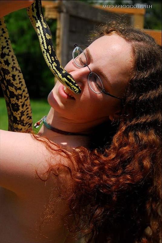 16P Hairy Nudist Outdoors Wearing Glasses and a Snake