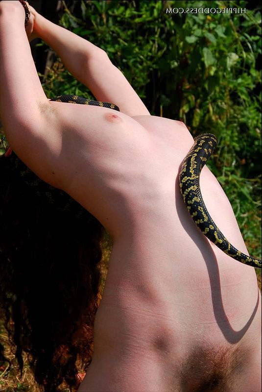 16P Hairy Nudist Outdoors Wearing Glasses and a Snake