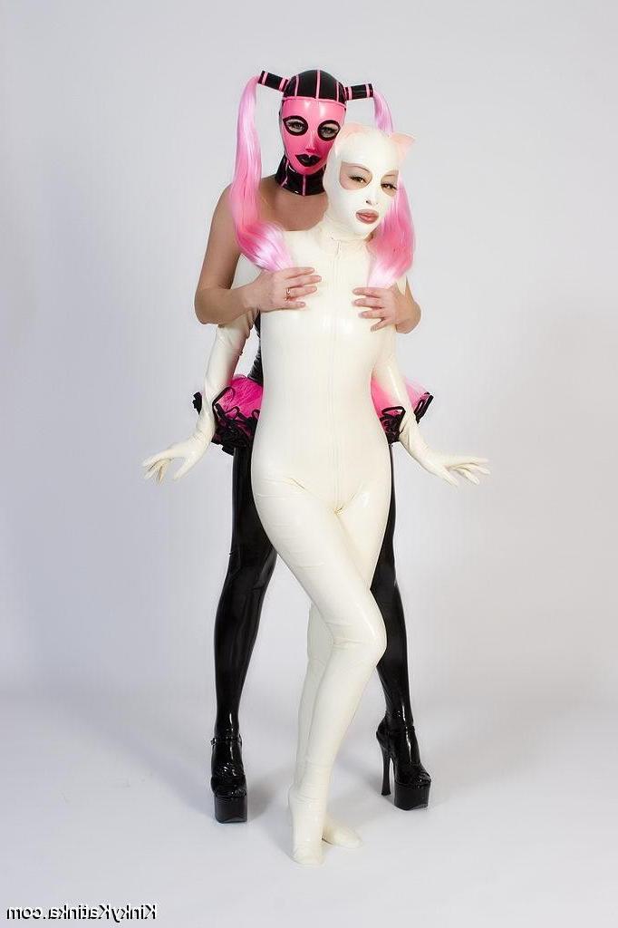 16P Two babes wearing kinky latex outfits