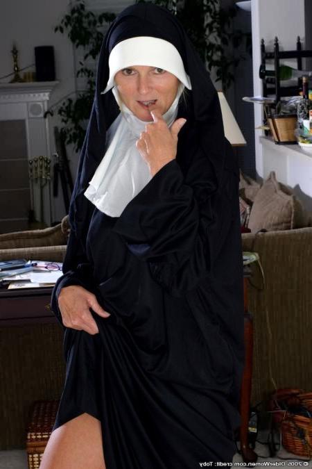 16P Naughty Older Nun Bares Nakedness Under Her Habit
