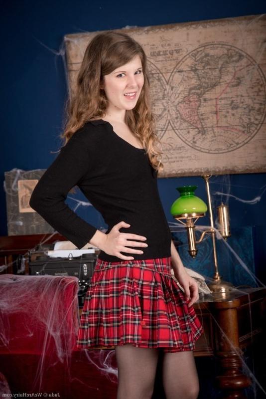 16P Jada strips off fishnet stockings and plaid skirt