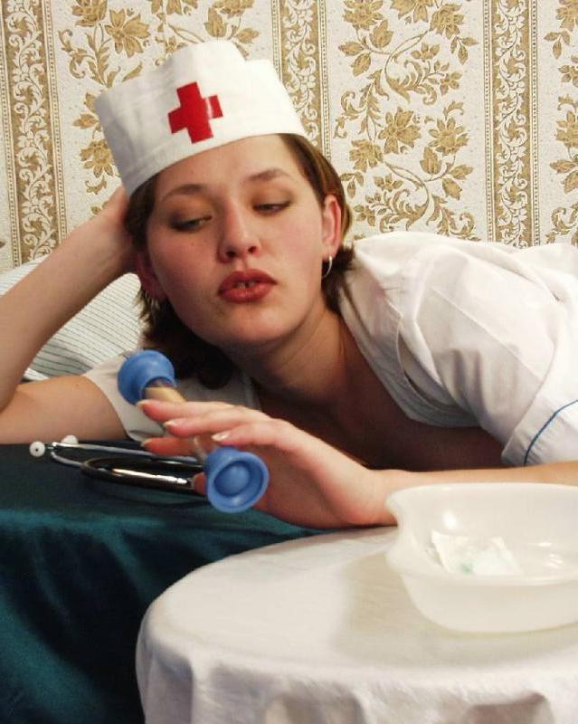 20P Hairy twat nurse loves to tease while stuffing her twat