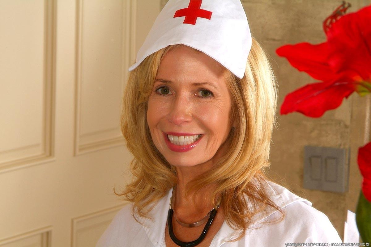 15P Hot blonde mature with tight body dressed as a sexy nurse