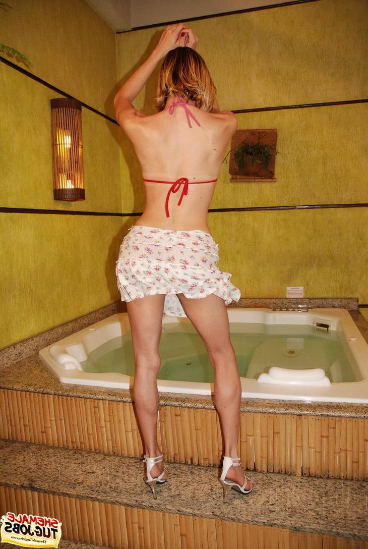 11P Shemale having a go at her cock in a jacuzzi