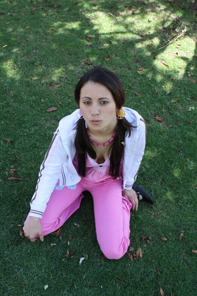 16P Latina teen girl at public playground