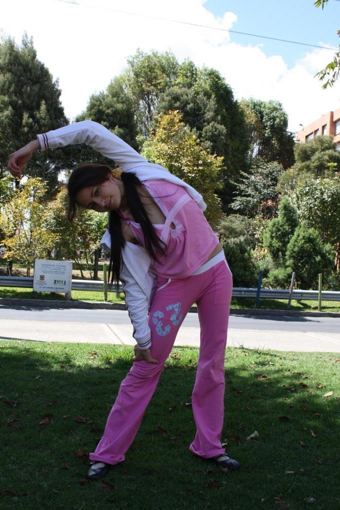16P Latina teen girl at public playground
