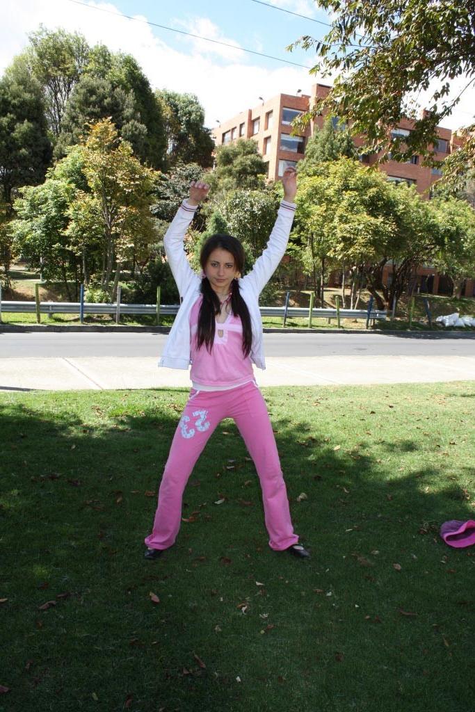 16P Latina teen girl at public playground