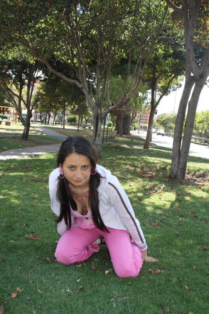 16P Latina teen girl at public playground