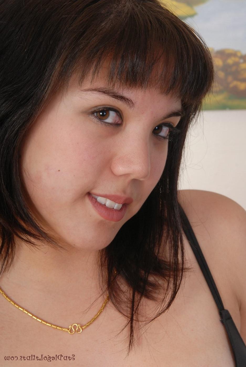 15P A stripping chubby latina babe get naked and shows her peaky tits