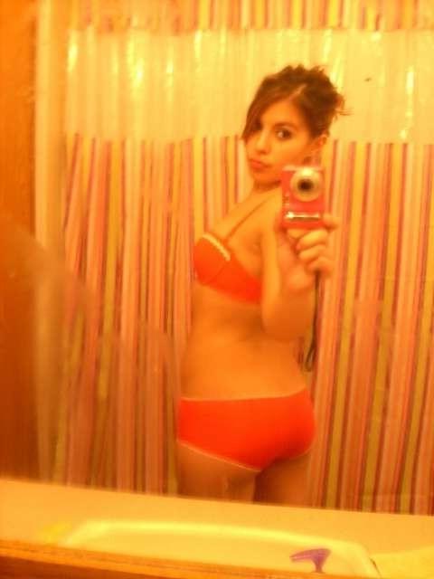 16P Latina teen takes mirror pics and masturbates