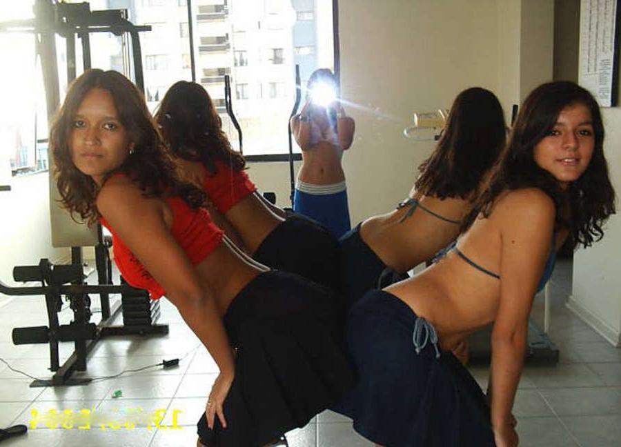 15P Sexy Latinas taking off their tops off in the gym