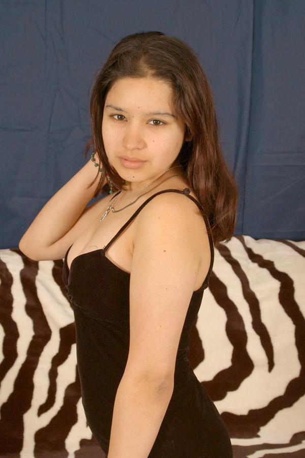 15P Fresh latina babe playing with her tiny pussy lips nude