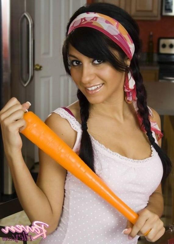 15P Cute Raven Riley plays with her clean shaved muff