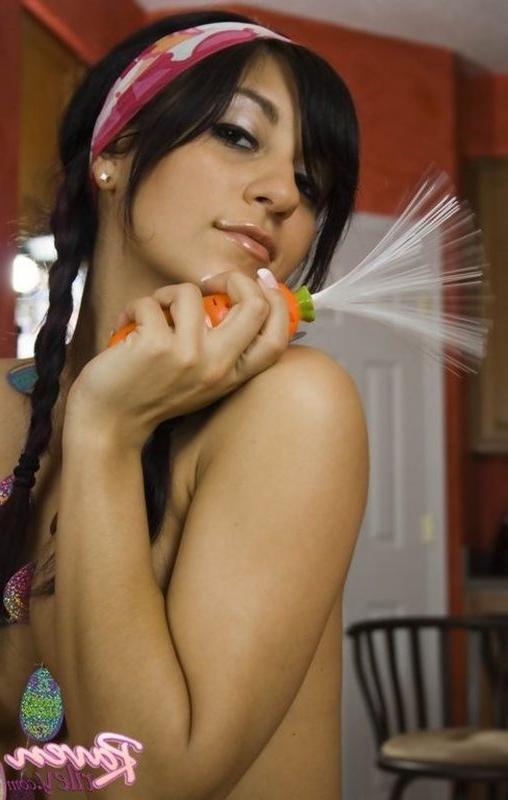 15P Cute Raven Riley plays with her clean shaved muff