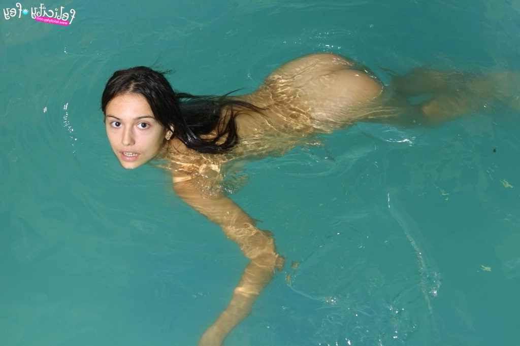 25P Busty latina in fishnet skirt having fun at the pool