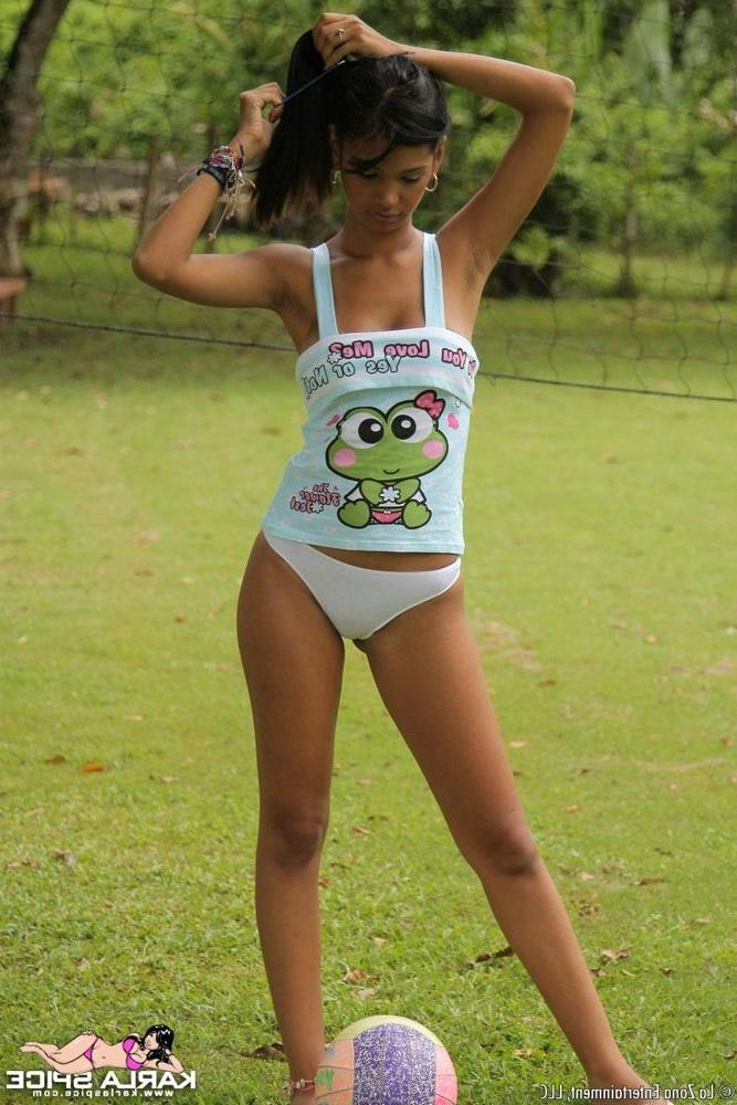 16P Latina teen playing volleyball