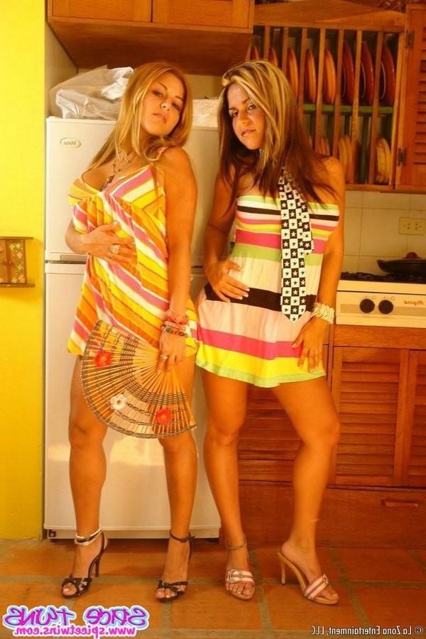 14P two latina teens posing