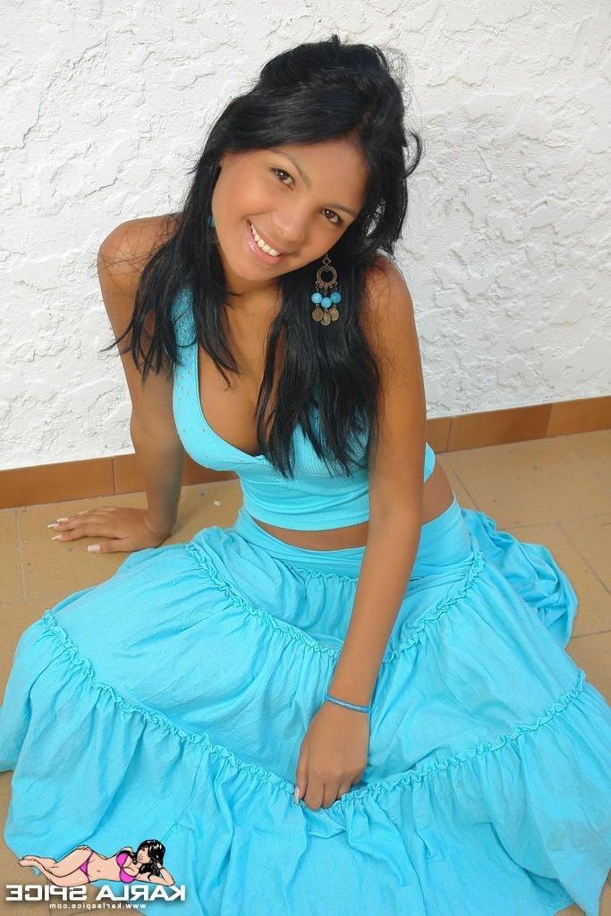 15P Petite latina teen teases the camera with her tight body
