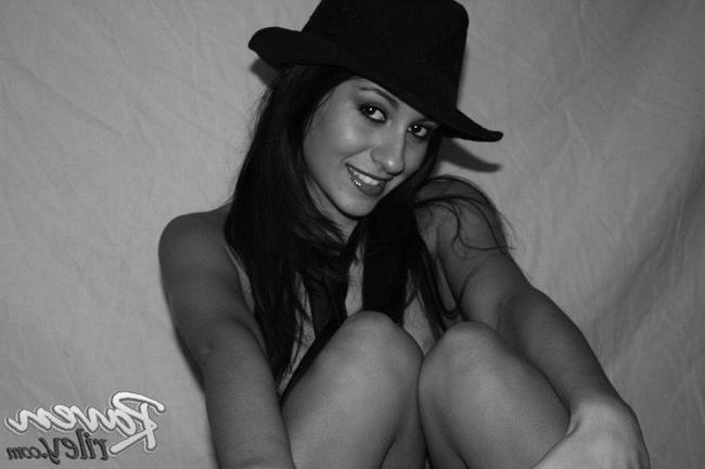 15P Horny latina babe stripping some sexy lingerie