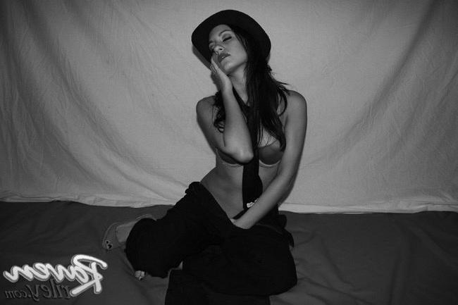 15P Horny latina babe stripping some sexy lingerie