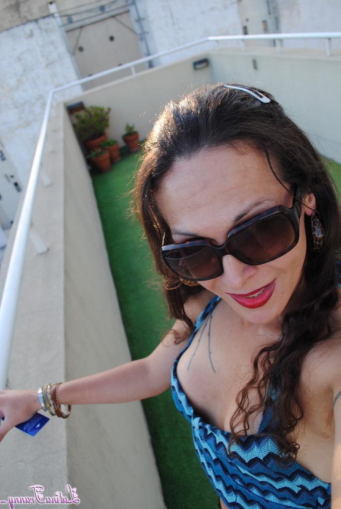 12P Sexy Nicole posing on the rooftop