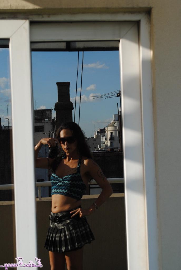 12P Sexy Nicole posing on the rooftop