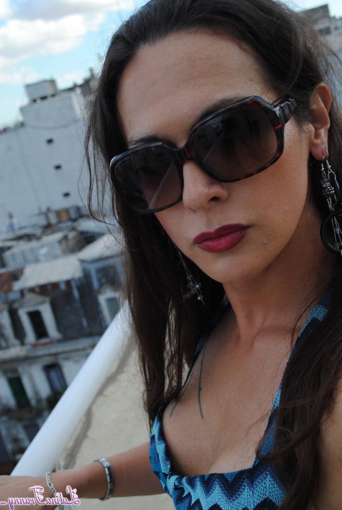 12P Sexy Nicole posing on the rooftop