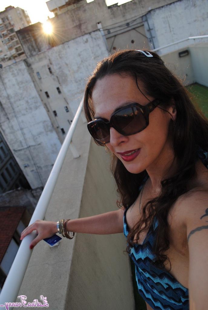 12P Sexy Nicole posing on the rooftop