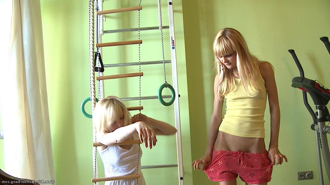 17P Two exciting blonde girlfriends toying each other in the gym