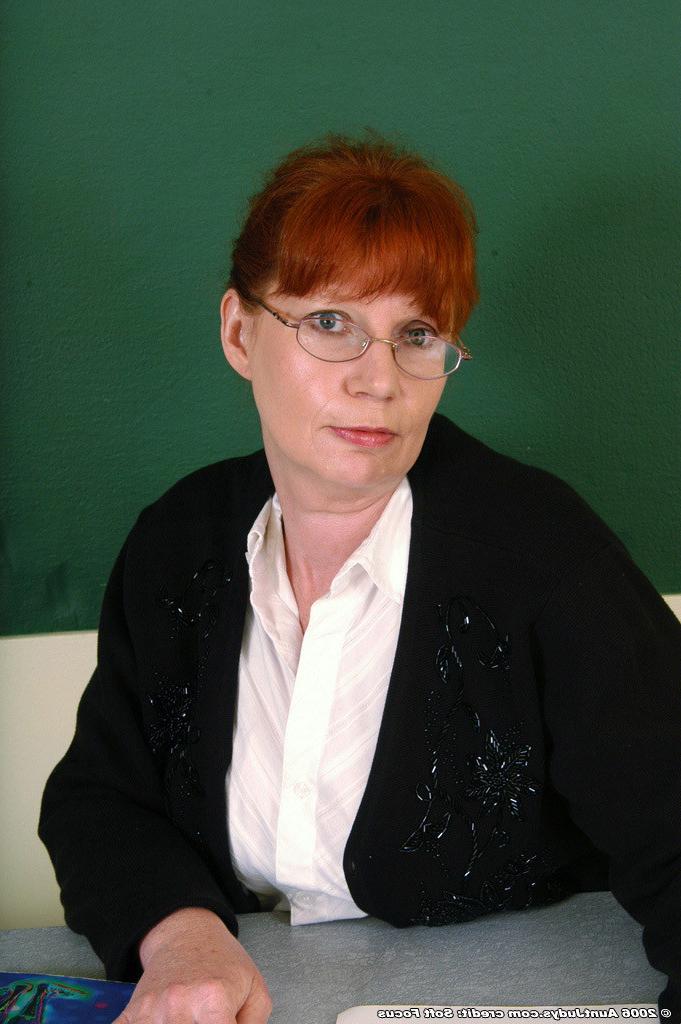 16P Sexy older school teacher strips and shows off her goodies