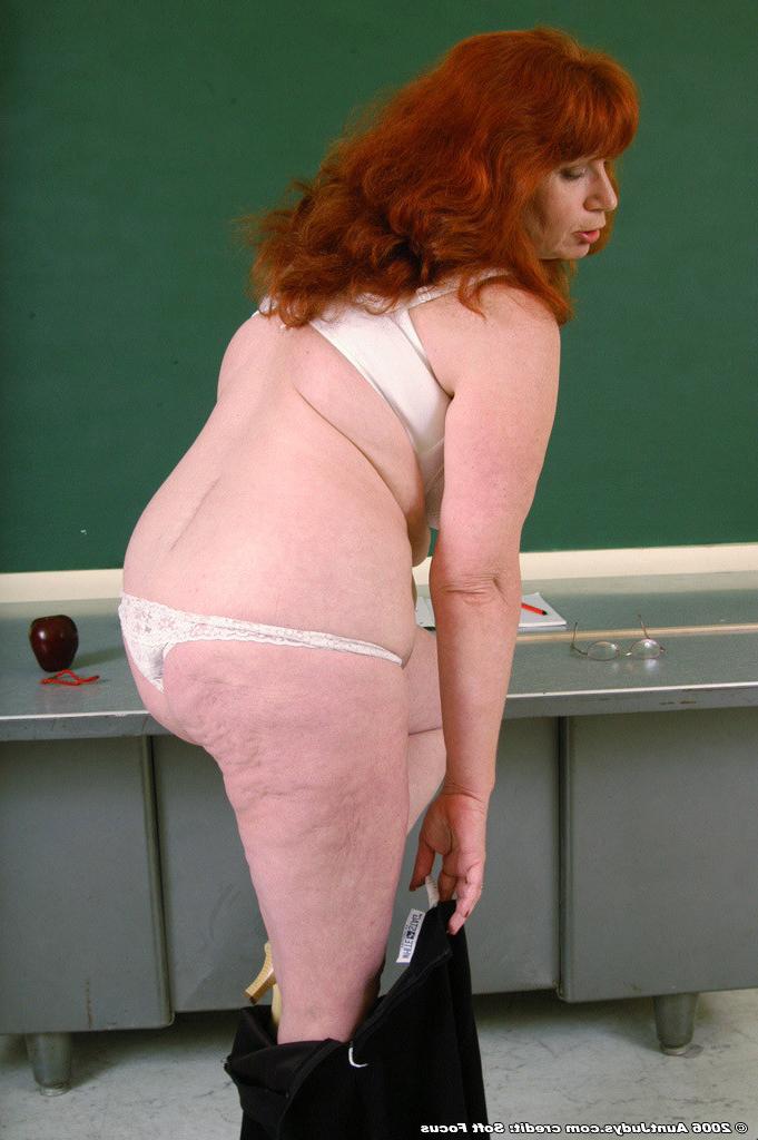16P Sexy older school teacher strips and shows off her goodies