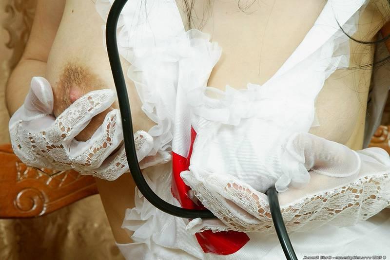 14P Slutty nurse cups her big tits
